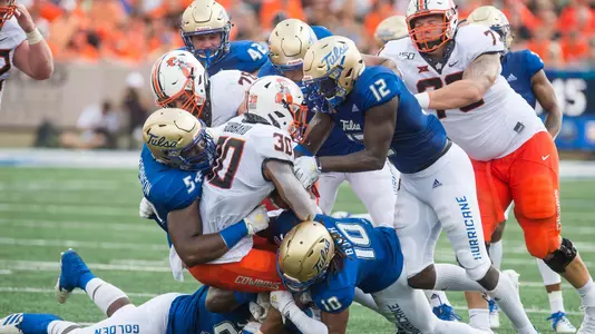 Tulsa gang tackles runner