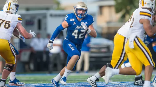 Cooper Edmiston plays defense against Wyoming