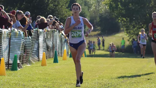Caitlin Klopfer crosses the finish line