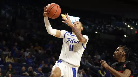 Darien Jackson goes for a layup