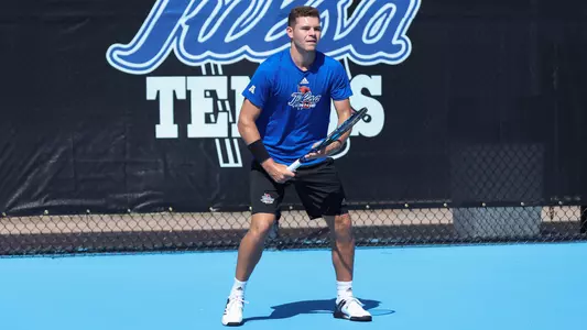 Connor Di Marco waiting for serve at Poster Day