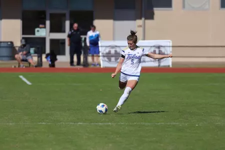 Emily Brandenburg playing soccer