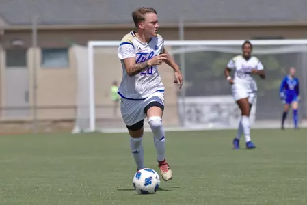 Bree Doeble playing soccer