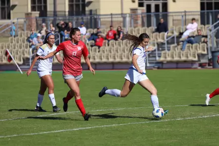 Averee Dubach playing soccer