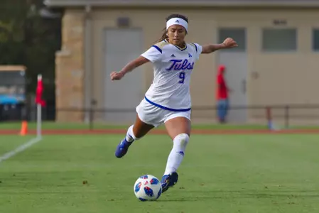 Liliana Fernandez playing soccer