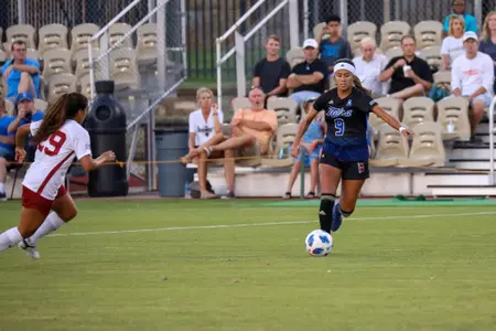 Liliana Fernandez playing soccer