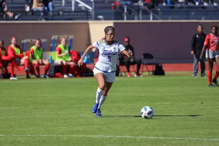 Liliana Fernandez playing soccer