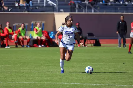 Liliana Fernandez playing soccer