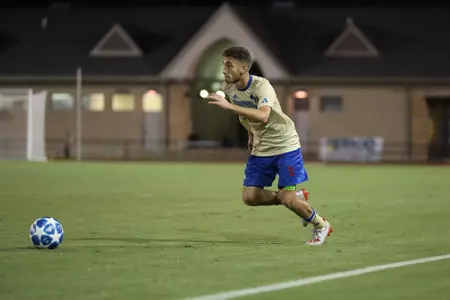 Adam Habib playing soccer