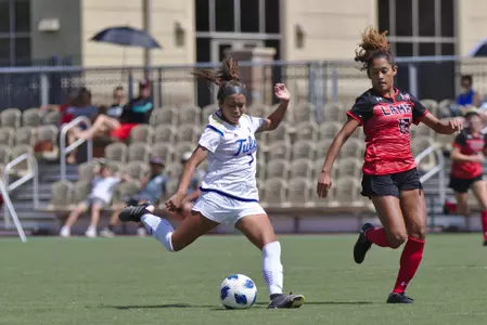 Emilie Torres playing soccer