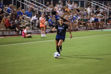 Emilie Torres playing soccer