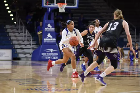 Rebecca Lescay playing basketball