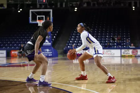 Rebecca Lescay playing basketball