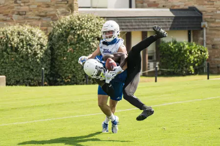 Catching the tough pass