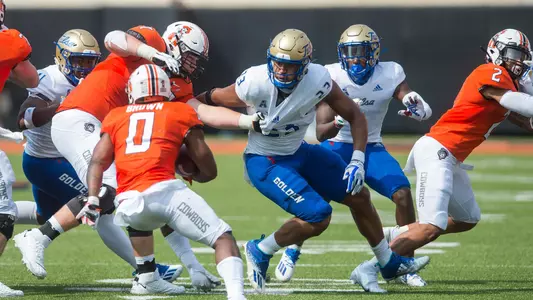 Zaven Collins being held vs. OSU