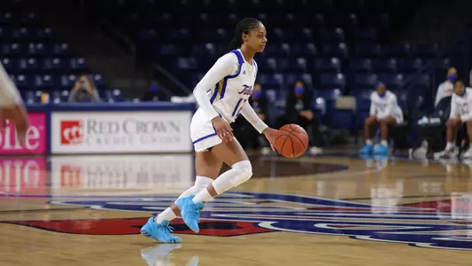 Wyvette Mayberry playing basketball