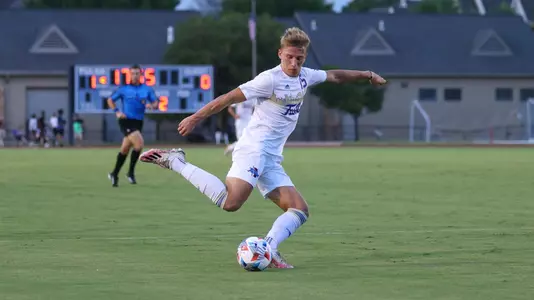 Alex Meinhard playing soccer