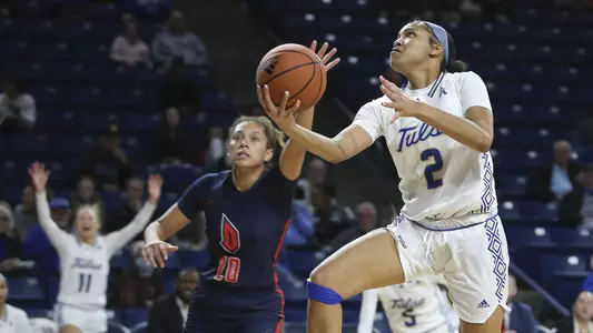 Temira Poindexter playing basketball