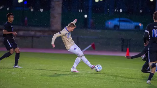 Alex Meinhard scoring a penalty kick