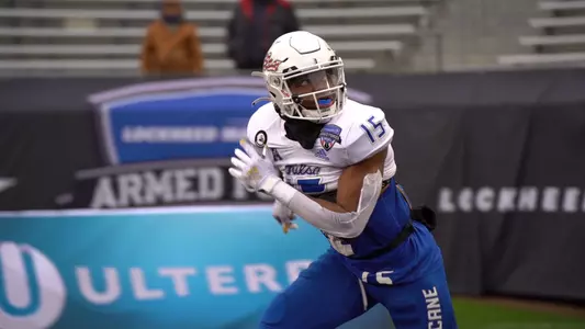 Reggie Ellis playing football