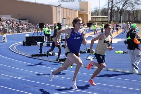 Kaden Hicks running track