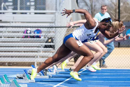 Cara Johnson running track