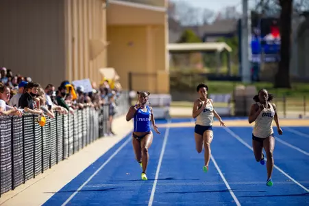 Cara Johnson running track