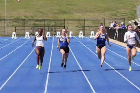 Cara Johnson running track