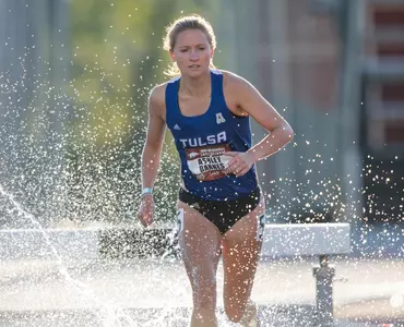 Ashley Barnes running the steeplechase