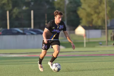 Mitchell Cashion playing soccer