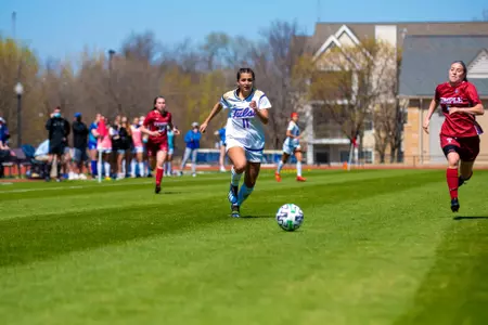 Kayla Fernandez playing soccer