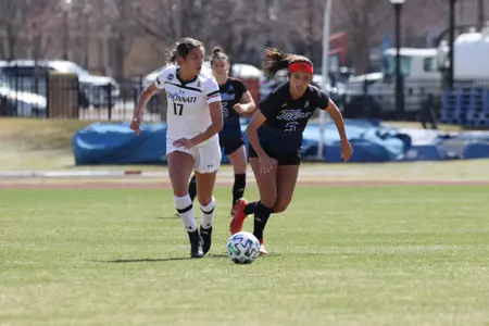 Liliana Fernandez playing soccer