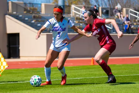 Liliana Fernandez playing soccer