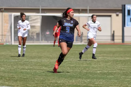 Liliana Fernandez playing soccer