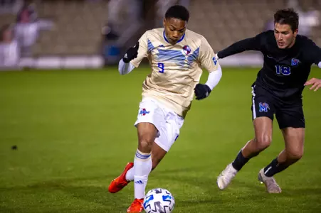 Malik Henry-Scott playing soccer