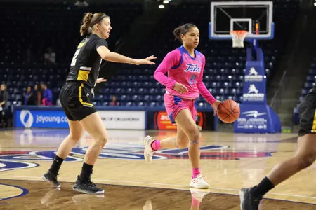 Rebecca Lescay playing basketball