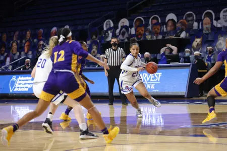 Rebecca Lescay playing basketball