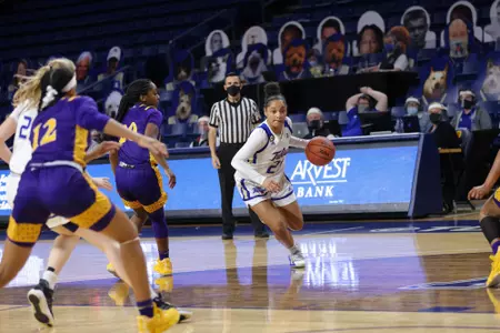 Rebecca Lescay playing basketball
