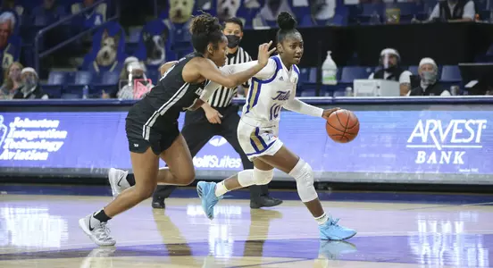 Maya Mayberry playing basketball