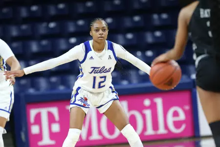 Wyvette Mayberry playing basketball