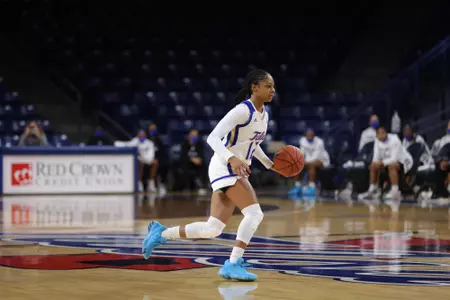 Wyvette Mayberry playing basketball