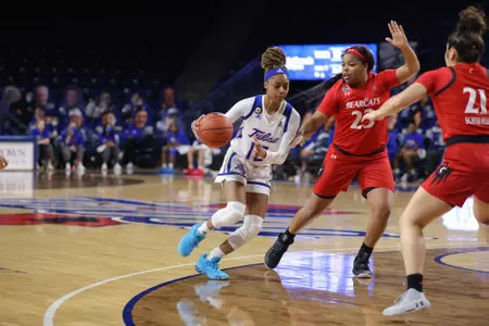 Wyvette Mayberry playing basketball