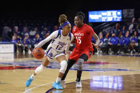 Wyvette Mayberry playing basketball