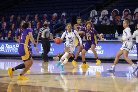 Wyvette Mayberry playing basketball