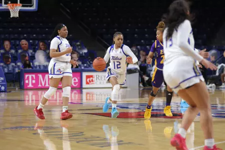 Wyvette Mayberry playing basketball