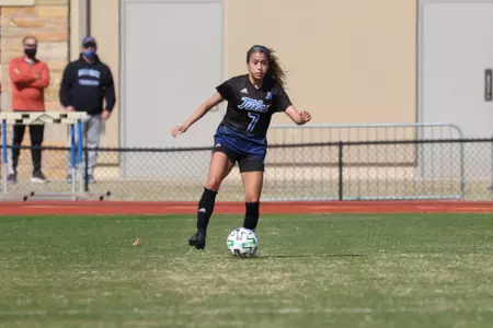 Emilie Torres playing soccer