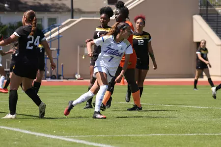 Emilie Torres playing soccer