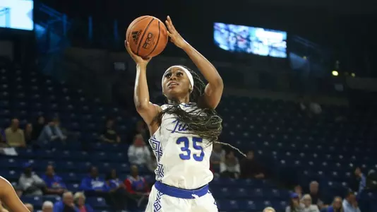 Ahrray Young playing basketball