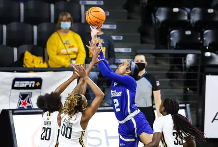 Temira Poindexter playing basketball