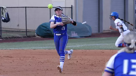 Celeste Wood playing softball